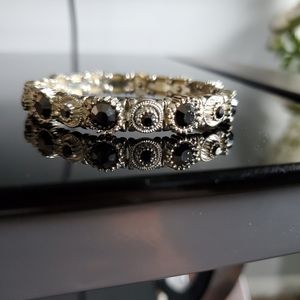 Black and Silver studded with black stones stretch bracelet. 2.5" size